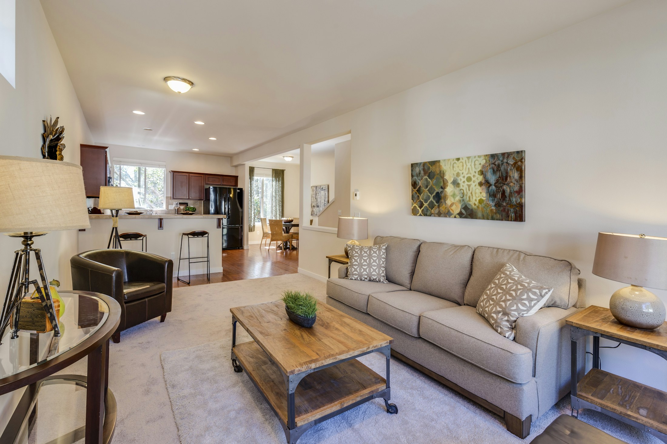 A welcoming, light-filled living room with comfortable seating